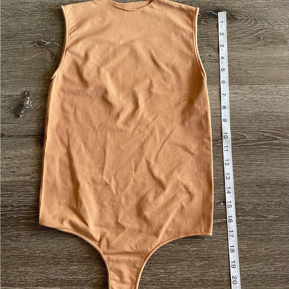 SKIMS women’s Sleeveless Bodysuit in Tan